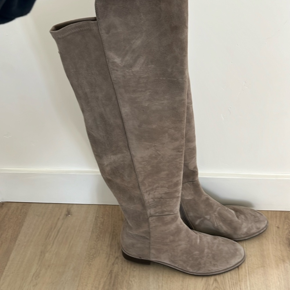 Stuart Weitzman light brown suede boots.